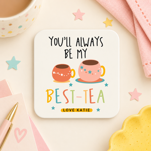 Personalised Best Tea positivity coaster in a soft cream Amy Lucy setting with pastel stars, pink stationery and tea