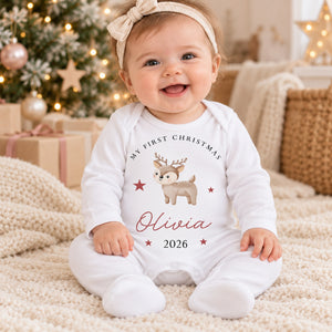 Baby wearing a personalised woodland reindeer First Christmas rompersuit with Olivia 2026