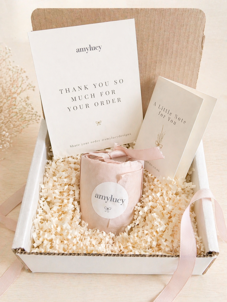 Overhead detail of an Amy Lucy personalised candle gift