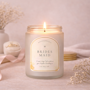 Candle with 'Brides Maid' label on a soft background