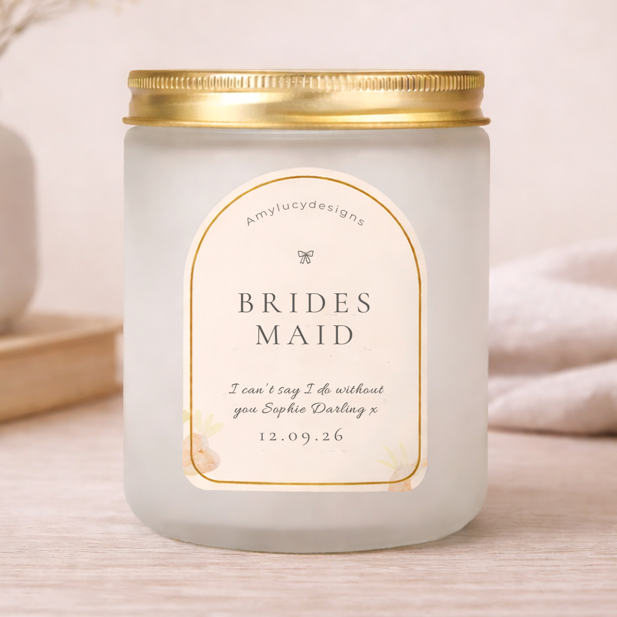 Candle with a personalized label on a light background