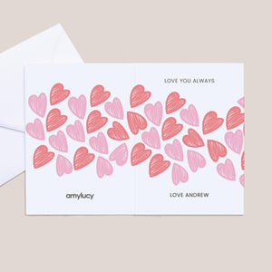 Greeting card with pink and red heart pattern and 'Love You Always' text on a beige background