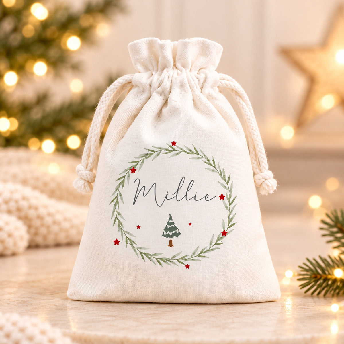 Personalised Millie hot chocolate gift bag with green wreath, red star and Christmas tree artwork