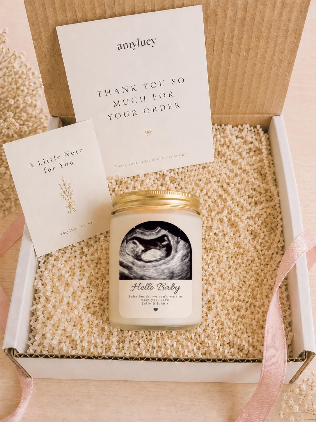 Close-up of the personalised label on the personalised Baby Scan Photo Candle Gift