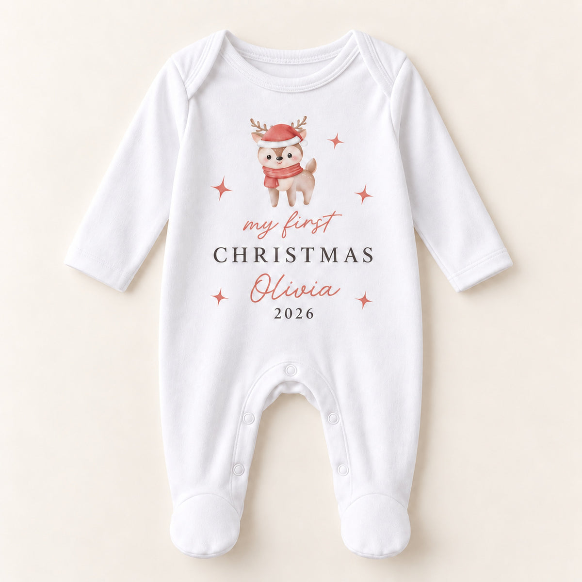 Personalised festive reindeer First Christmas baby rompersuit 2026 on a clean neutral background