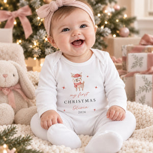 Baby wearing a personalised festive reindeer First Christmas rompersuit with Olivia 2026