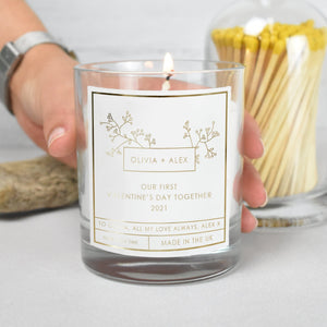 Lit personalised First Valentine’s Day Candle in a styled setting