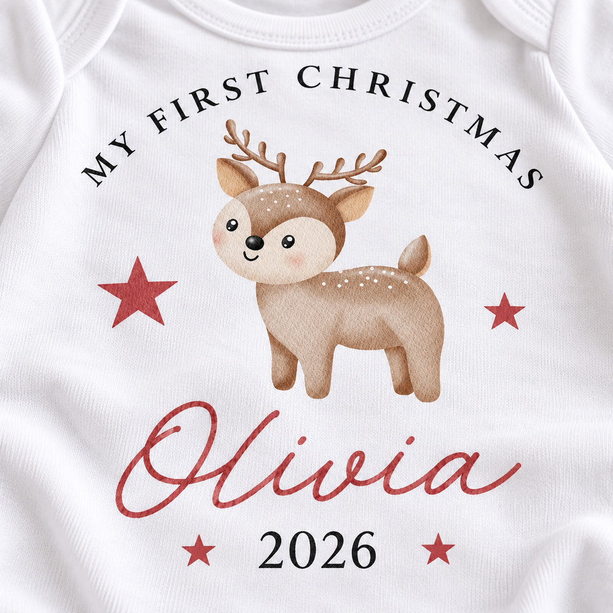 Close-up of personalised woodland reindeer First Christmas baby rompersuit design with Olivia 2026